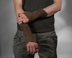 Brown faux suede fingerless gloves on man with arms crossed at waist, ren faire style – ZOLNAR