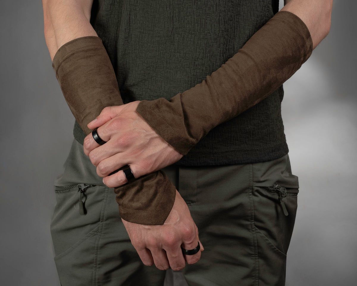 Brown suede arm bracers on crossed forearms, ren faire style – ZOLNAR