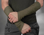 Khaki suede bracers layered with beige armband, close-up – ZOLNAR