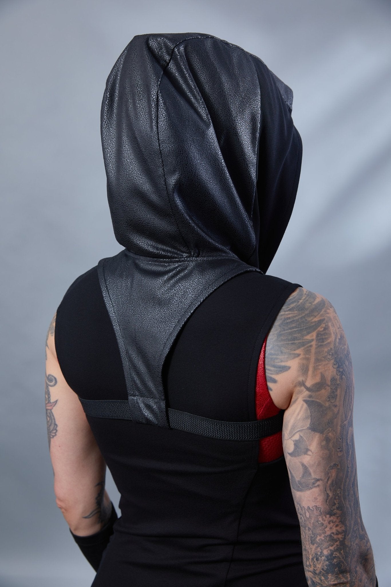 ERL Asymmetric sleeveless shirt with ERH hood
