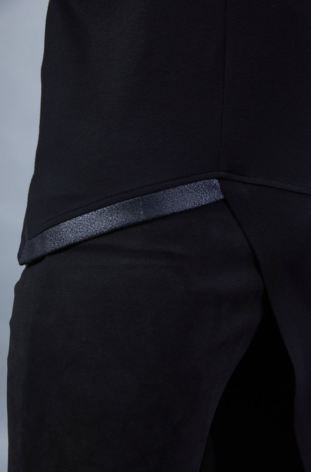 ERL Asymmetric sleeveless shirt with ERH hood